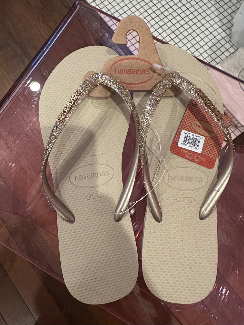 Havaianas Women's Flip Flops in Beige with Gold Glitter Straps